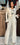 JUMPSUIT BLANCO MANGA LARGA CON DETALLES NEGROS
