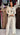 JUMPSUIT BLANCO MANGA LARGA CON DETALLES NEGROS